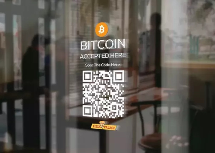 Znak da u lokalu može da se plati bitkoinom